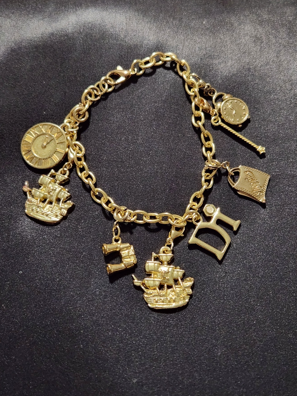 ​Vintage Diamonds International Gold Tone Caribbean Cruise Charm Bracelet